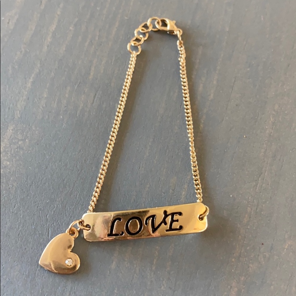 Love bar bracelet with heart. Brand new.